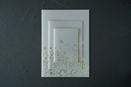 A6, A5, and A4 floral fountain pen notebooks in Pearl, shown in a stacked size comparison (hover view) — Rehiie Notebook Light.